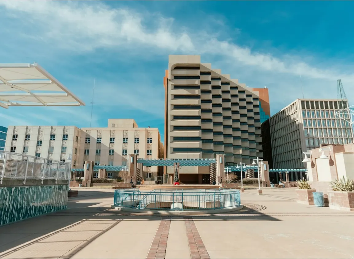 Large commercial building complex representing network infrastructure environments where LAN cable distance impacts performance, reliability, and system design
