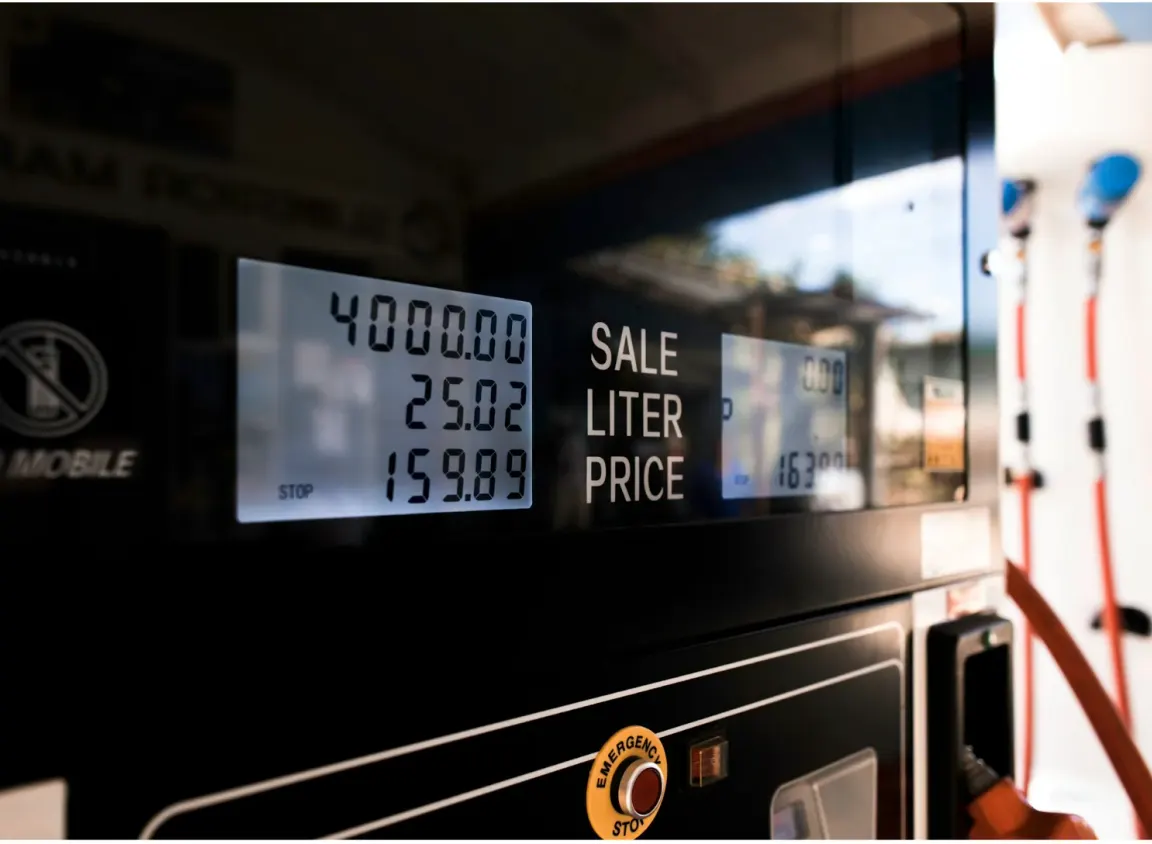 Fuel dispenser display at a commercial gas station, representing petroleum cable environments where shielded FEP cable supports CRIND and fuel system communication circuits