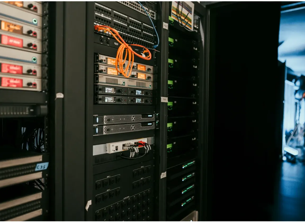 Commercial AV equipment rack with connected control systems, illustrating how control cable supports communication between audio, video, and automation platforms