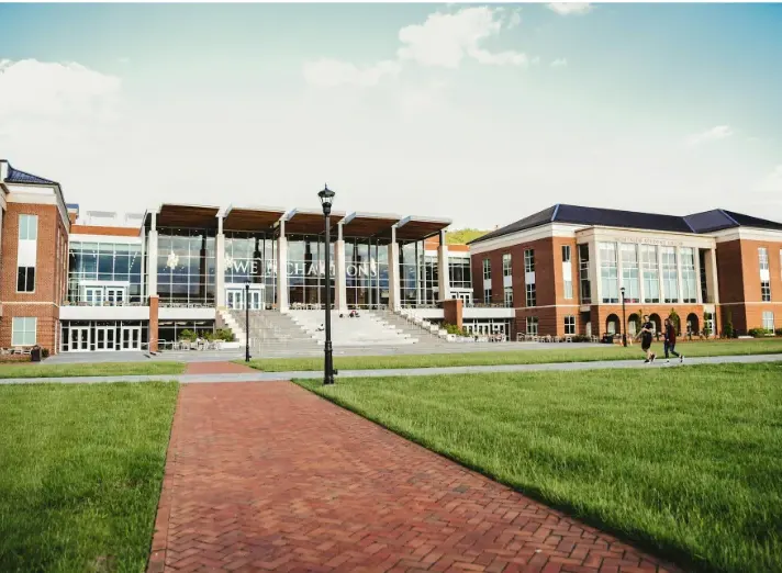 Commercial campus building connected by outdoor network infrastructure supporting inter-building communications and connected systems