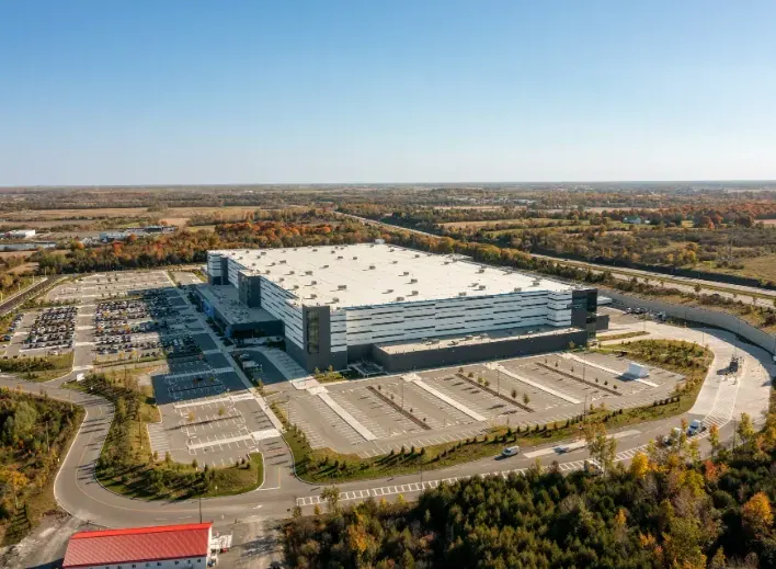 Large commercial facility where a distributed antenna system (DAS) helps improve indoor cellular signal coverage for employees, visitors, and connected building operations